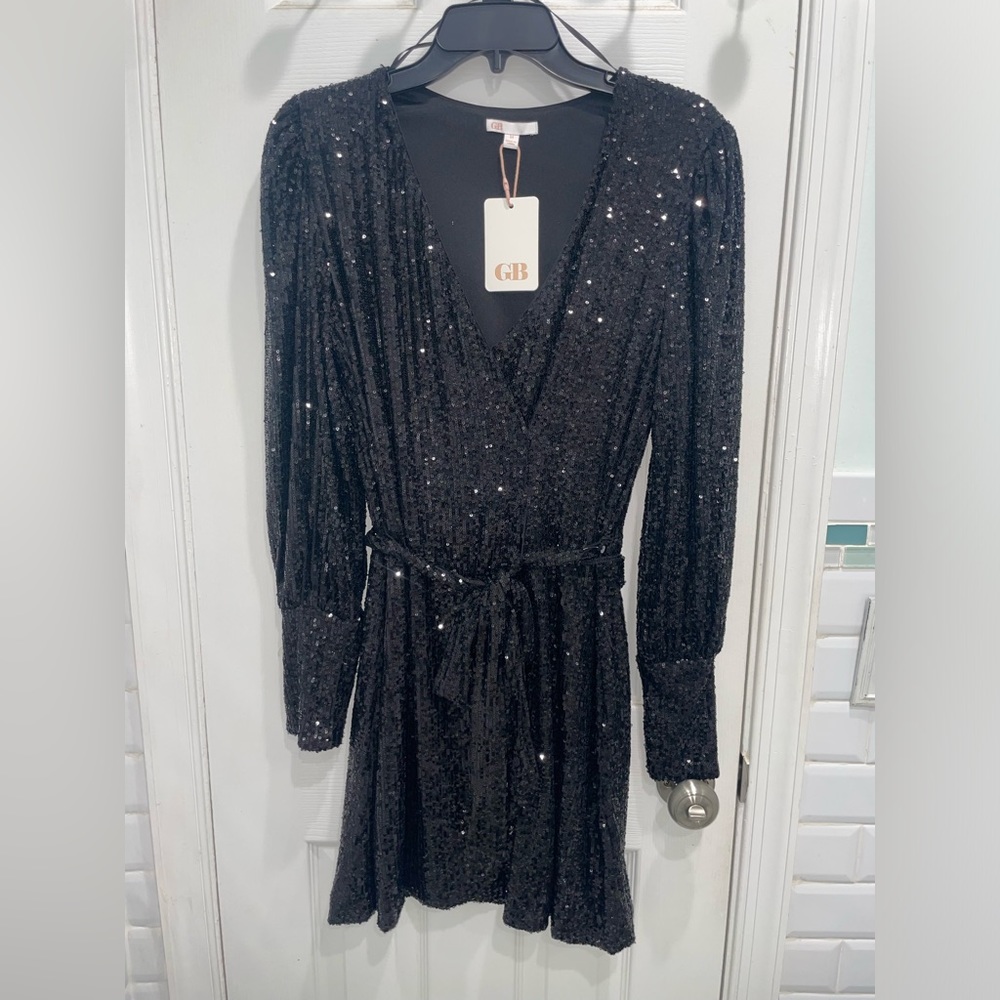 Black shimmer dress wraps around style
